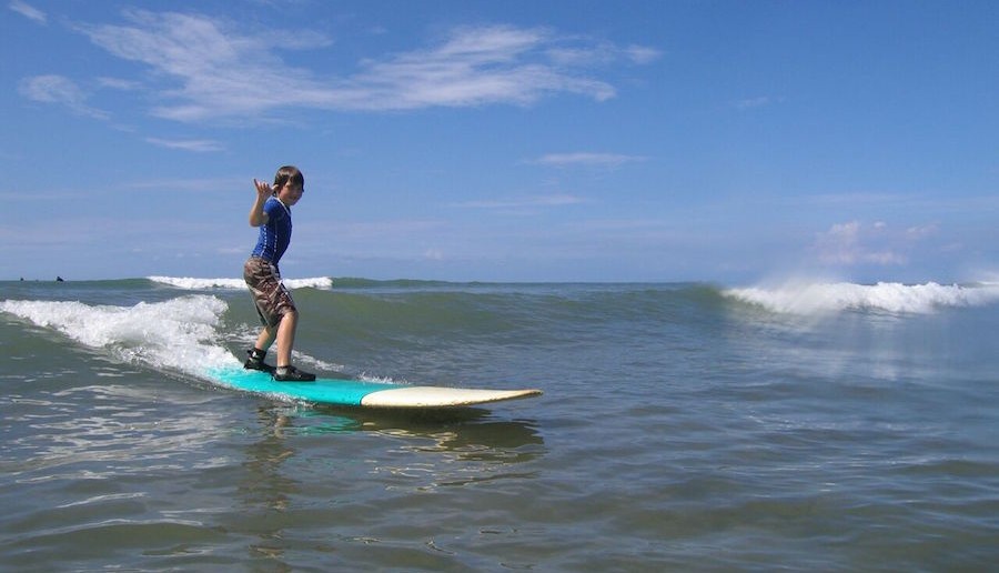 Puamana-Surf-Kid-Shaka-on-Wave